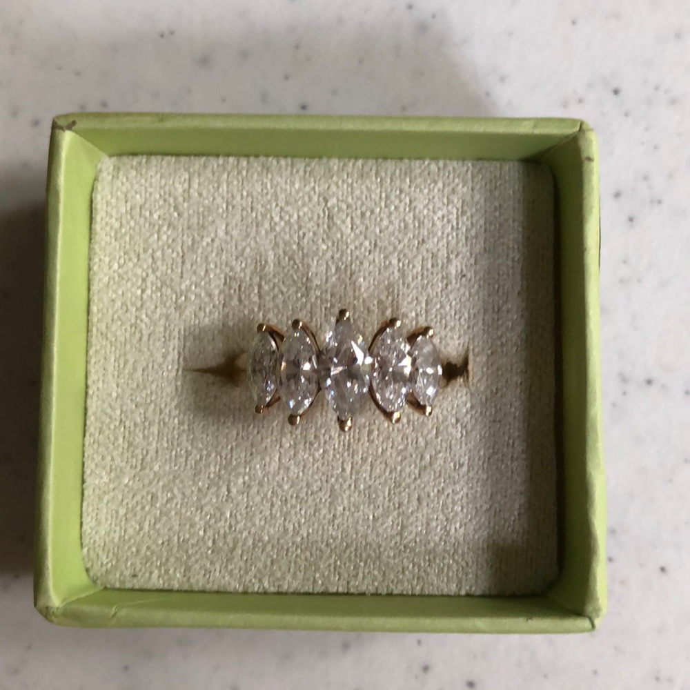 10K gold band with CZ marquis cut stones.
